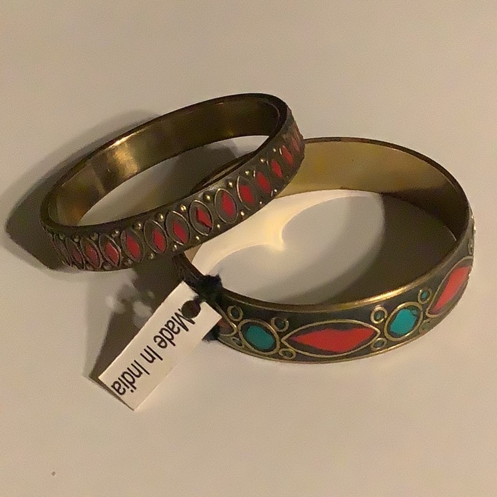 Pair of embellished red, red and turquoise metal bangle bracelets